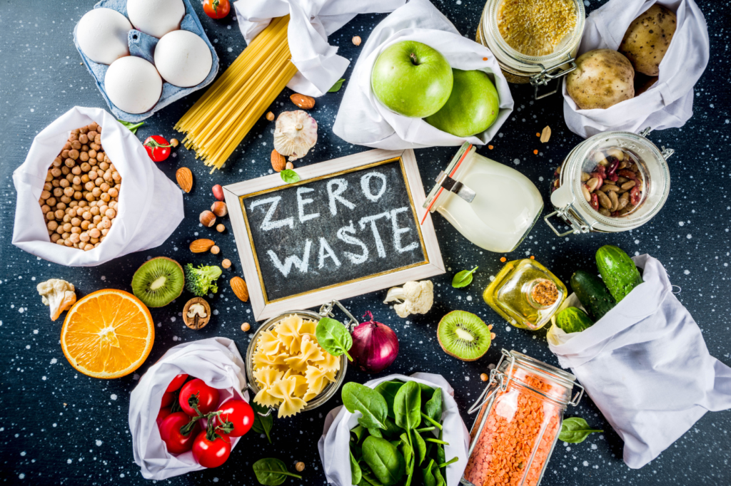 featured image for 6 amazing Tips for Sustainable Cooking + Techniques and Benefits showing a sign that says zero waste