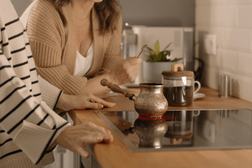featured image for 6 amazing Tips for Sustainable Cooking + Techniques and Benefits showing an induction cooktop