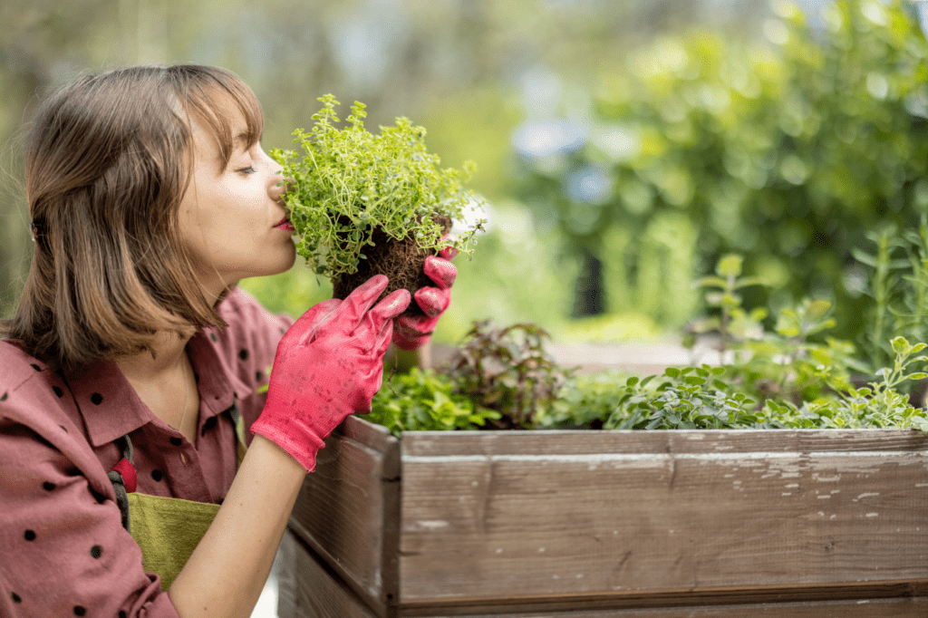 image showing a woman gardening