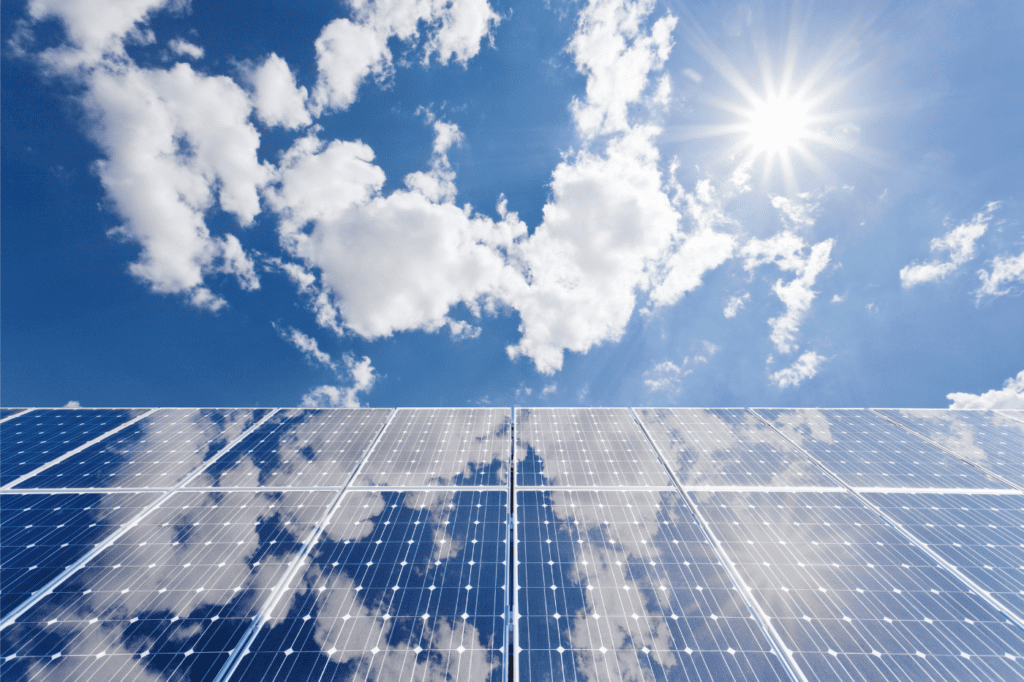 image showing a solar panel and clouds