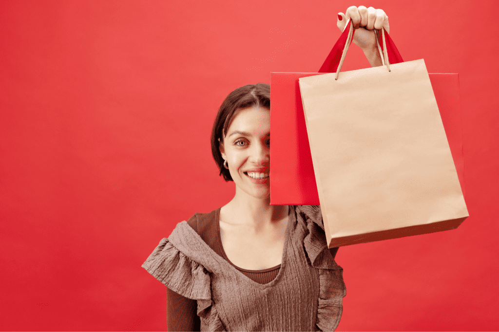 image showing a woman holding shopping bags
