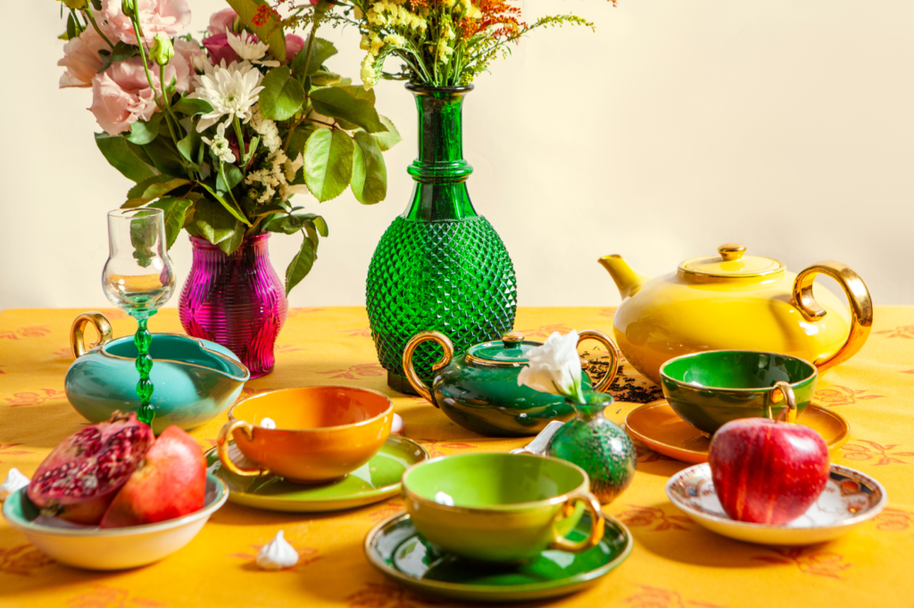 image showing a maximalist coffee table with lots of colors and cutlery