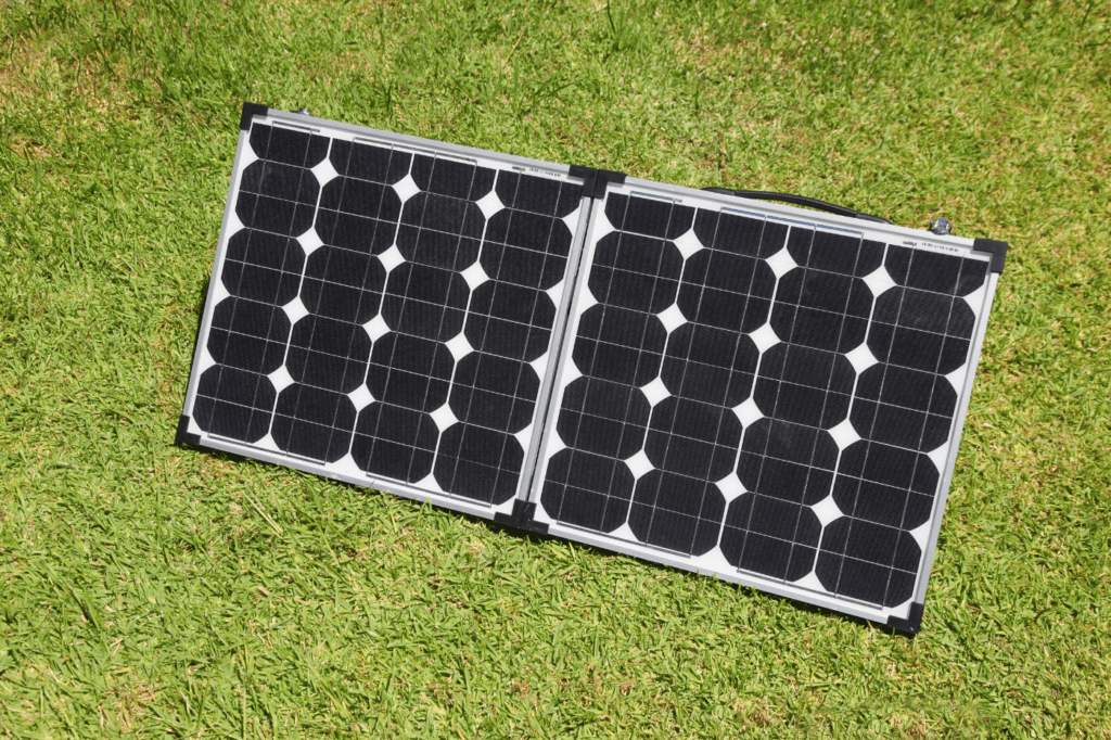 portable solar panel on gras
