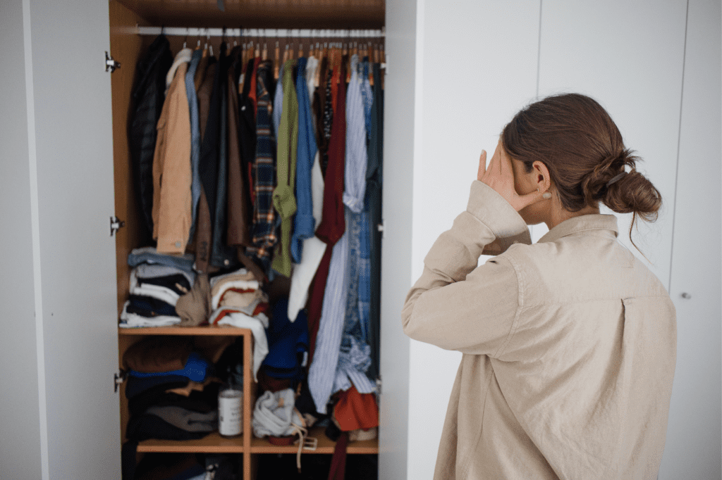 woman overwhelmed by clutter