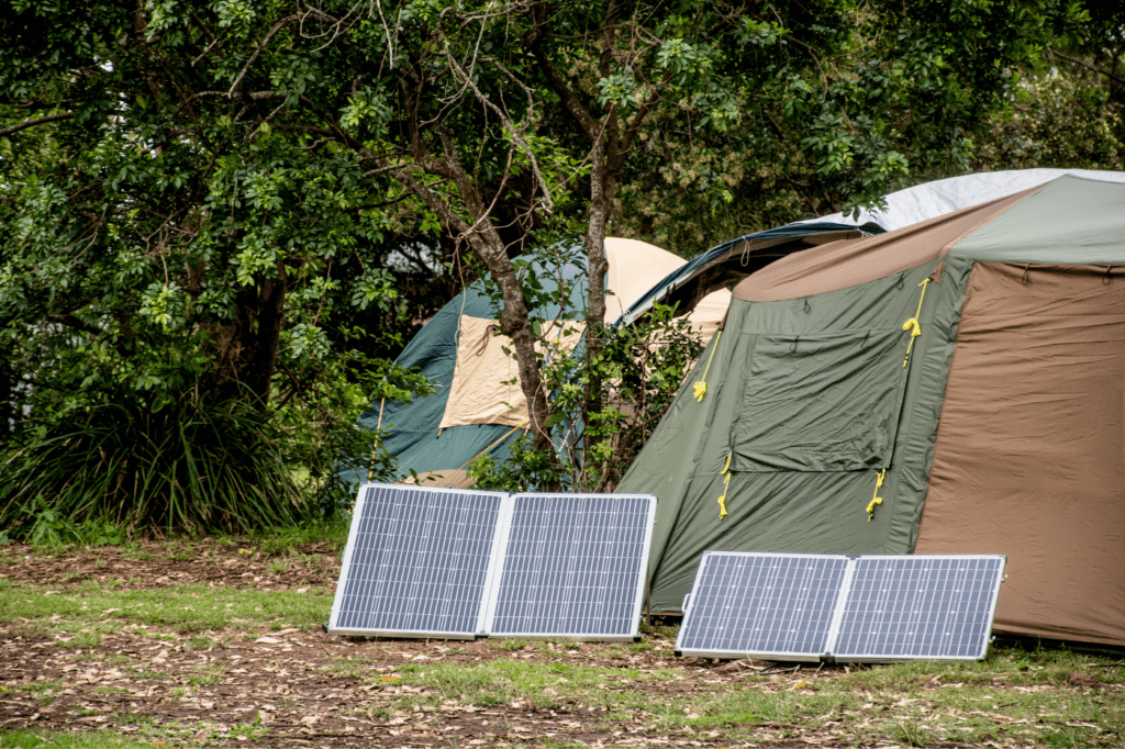portable solar panel in front of a tent