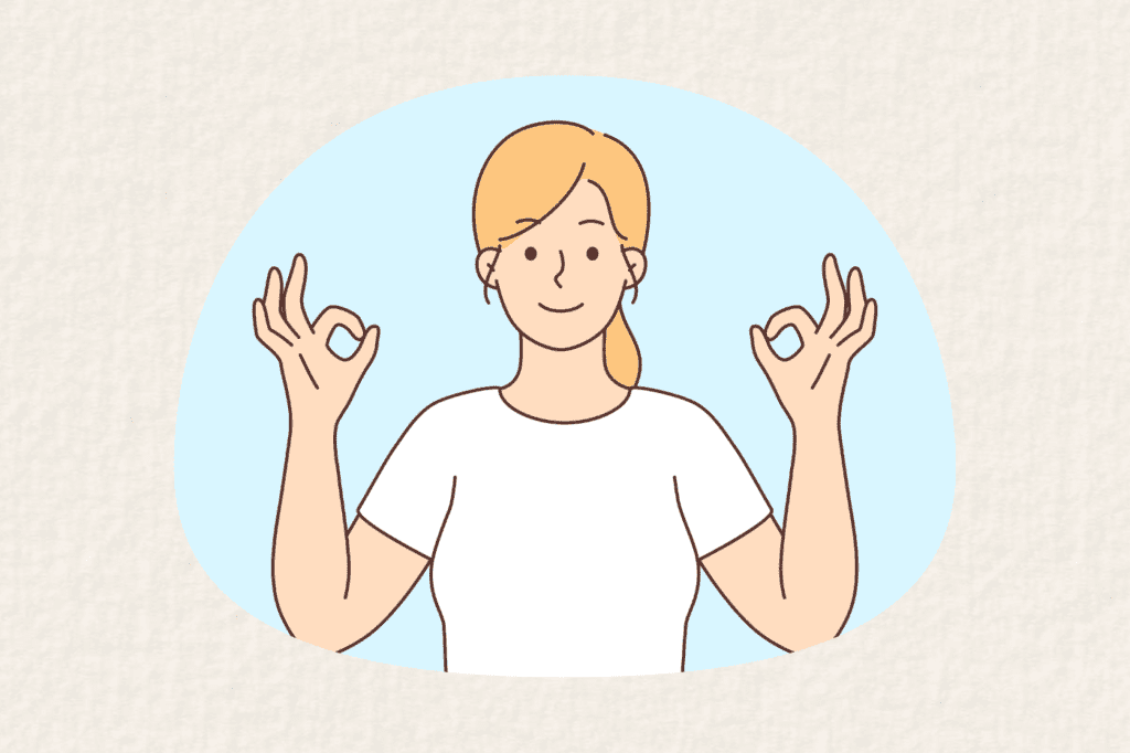 woman doing a mediation hand gesture (mudra)